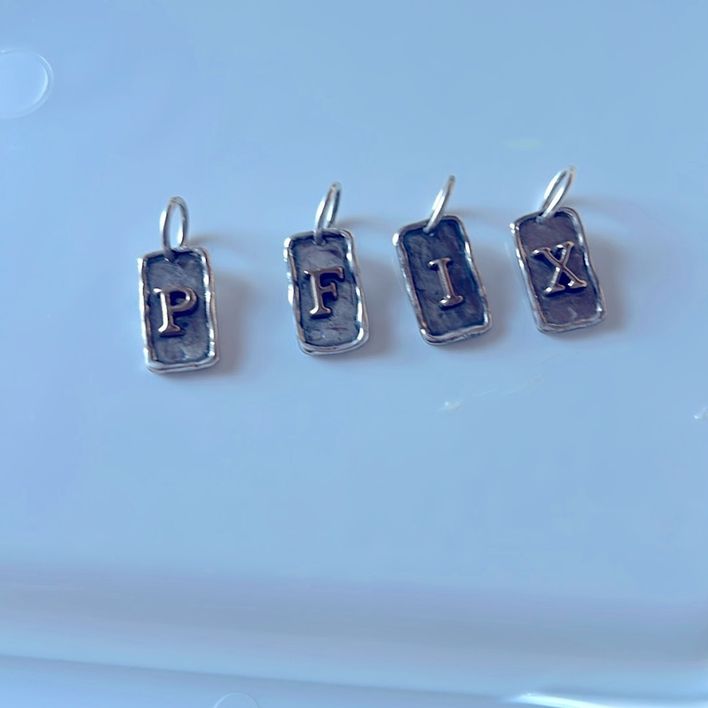 Waxing Poetic Tag Insigna Charm